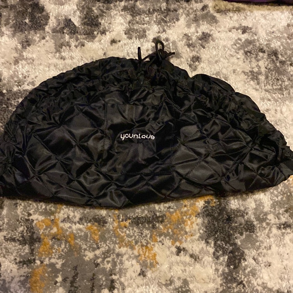 Younique drawstring makeup pouch and carry bag.